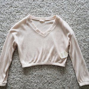 Long-sleeved off-white cropped sweater